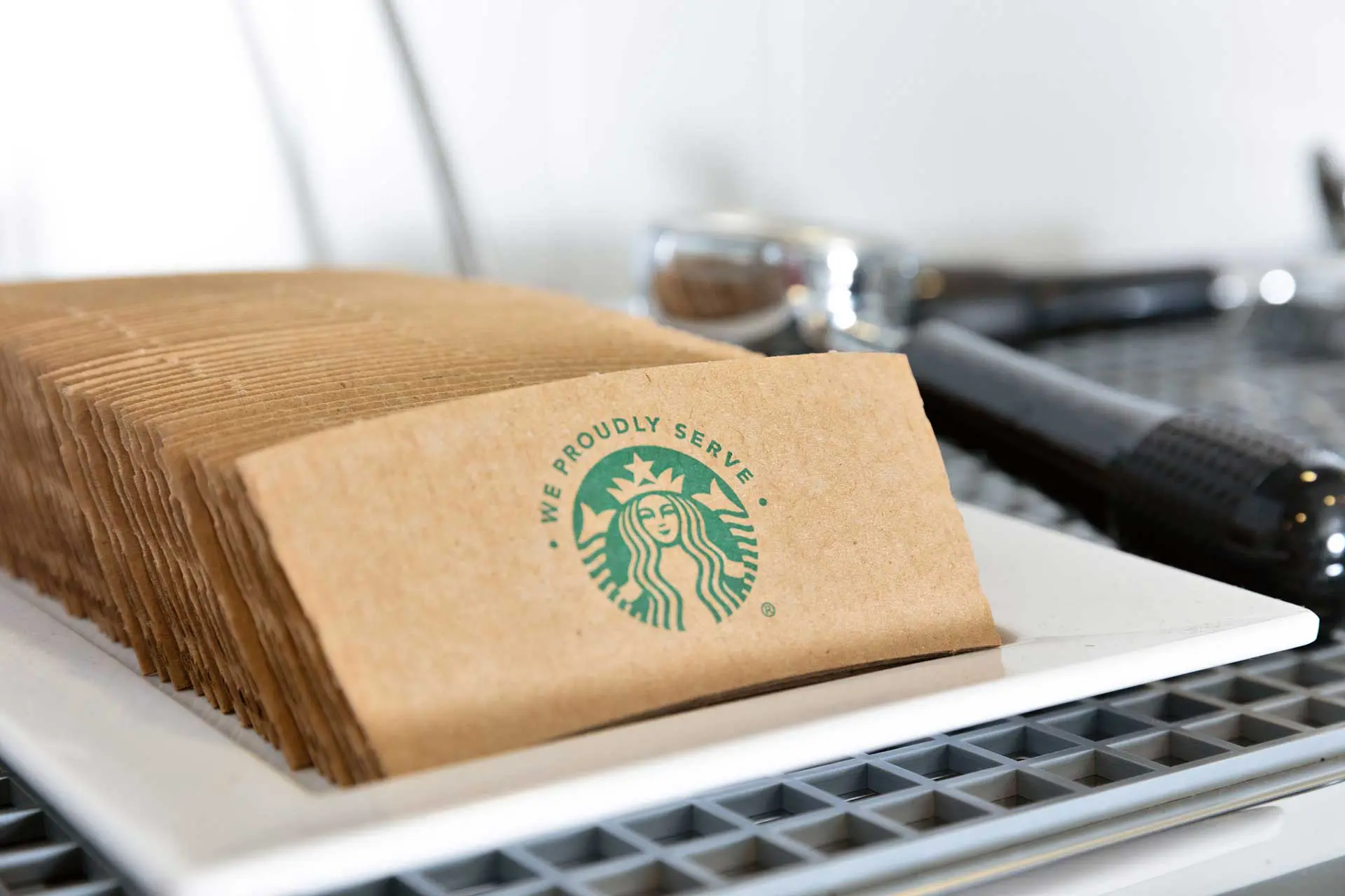 Tray of coffee sleeves on tray